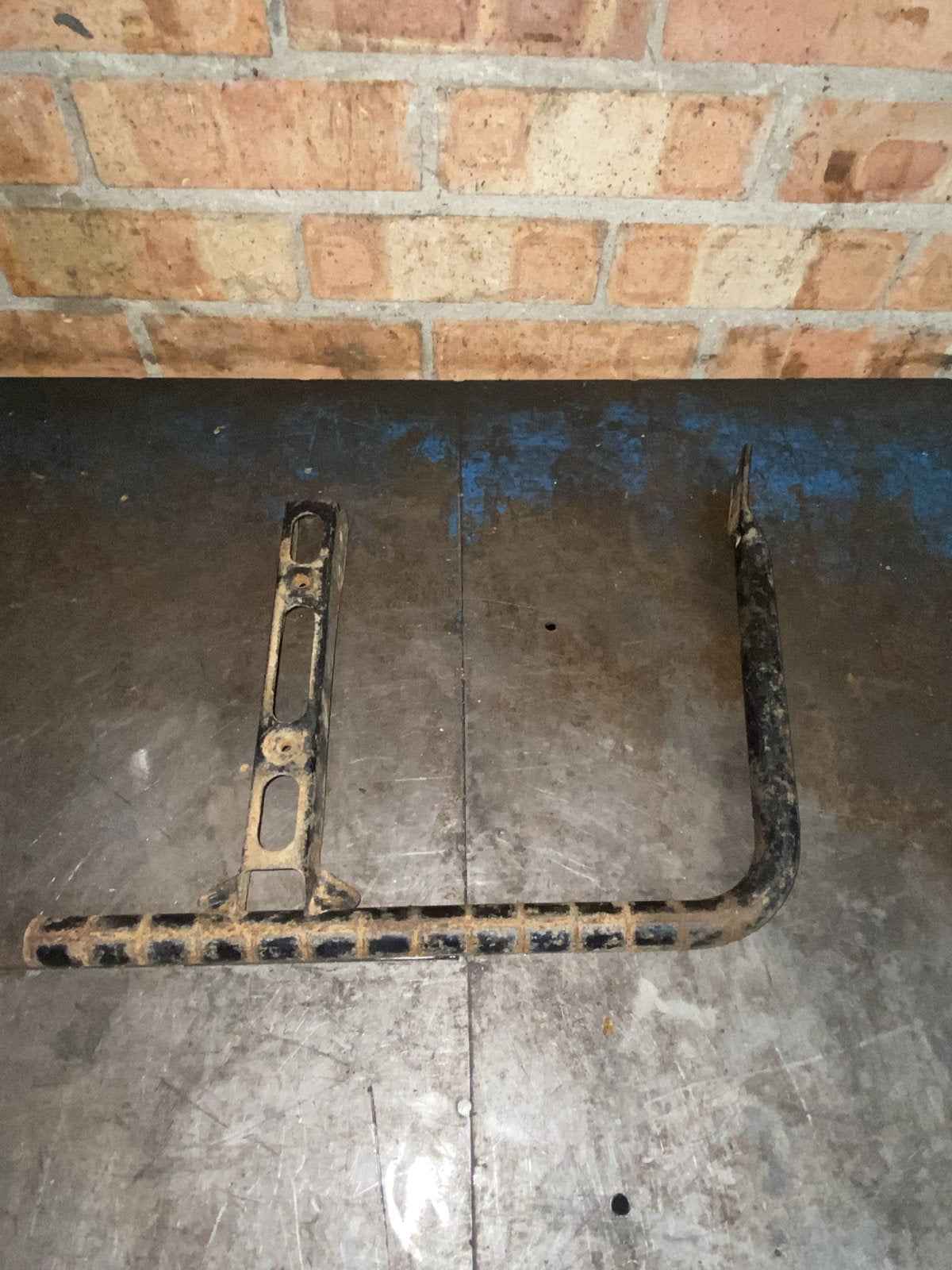 Used Honda TRX footwell bracket - single side, top view